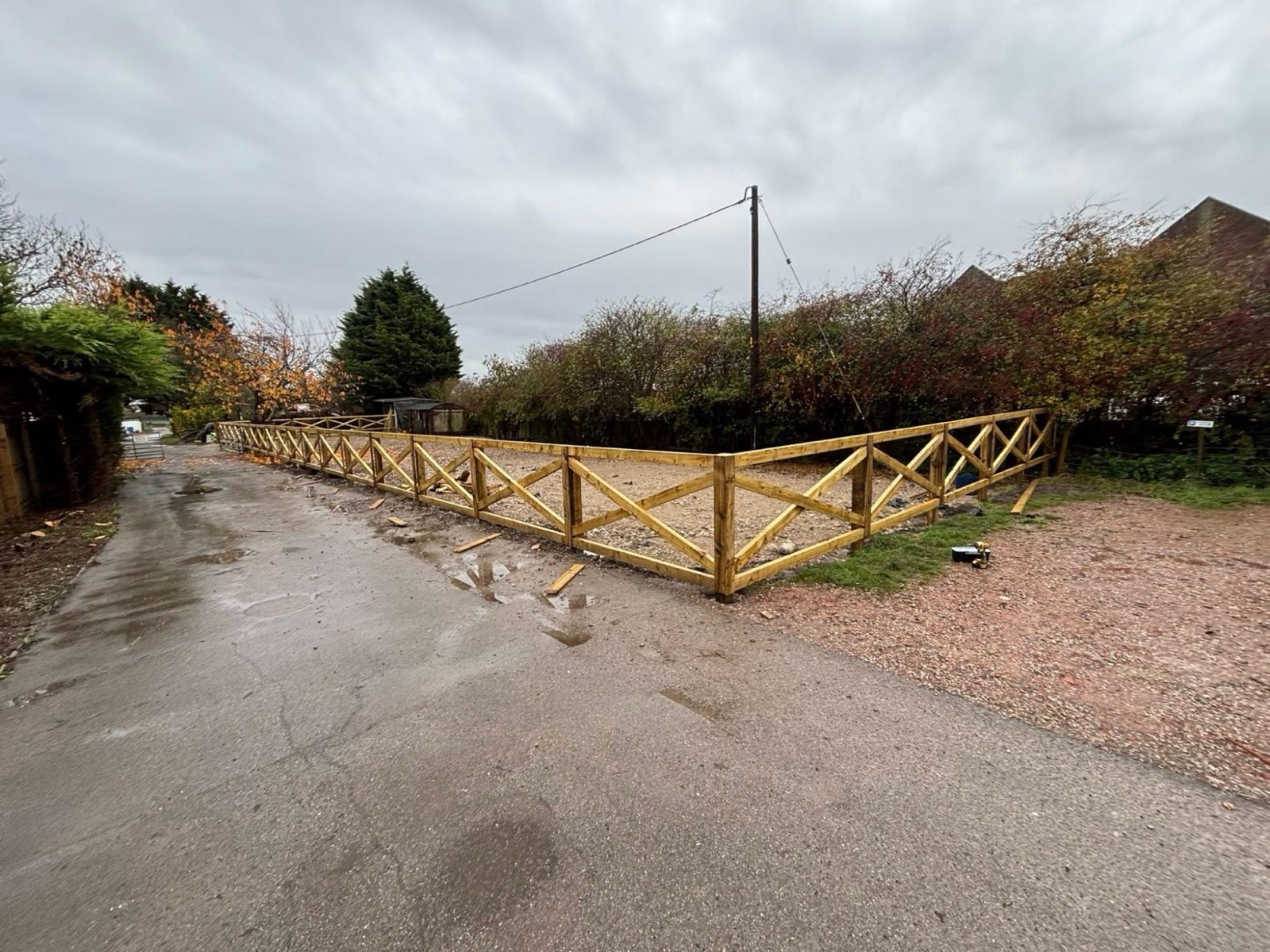 Post and rail boundary fence